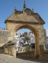 View through the stone Philip V arch towards the white town, Ronda, Malaga Province, Andalucia, Spain, Europe