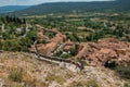 View of stone staircase, roofs and belfry above Moustiers-Sainte-Marie. Royalty Free Stock Photo