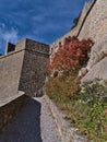 View of the stone walls of medieval Sisteron Citadel in Provence region, France on sunny day in autumn.