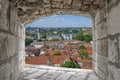 View from stone window of city center in Vilnius, Lithuania.  View from above of St. Stanislaus Cathedral on Cathedral Square, Royalty Free Stock Photo
