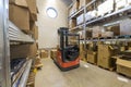 View of storage warehouse. Fork lift truck in warehouse. Sweden