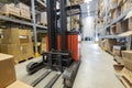 View of storage warehouse. Fork lift truck in warehouse. Sweden