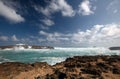 View of storm surf waves crashing into Laie Point rocky coastline at Kaawa on the North Shore of Oahu Hawaii USA Royalty Free Stock Photo