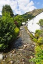 View of stream and mountains in Coniston town Lake District Cumbria England uk Royalty Free Stock Photo