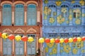 A view of a street in Chinatown district with colorful old buildings and red and yellows lanterns decorations. Royalty Free Stock Photo