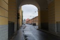 St. Petersburg, Russia, October 28, 2023. View of a city street through the arch of a building.
