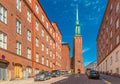 View of a street of Helsinki with the traditional red brick architecture Royalty Free Stock Photo