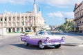 View of a street of Old Havana with old vintage American car Royalty Free Stock Photo