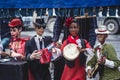 View of street puppet show theatre, with puppeteer puppet master pulling the strings over marionette dolls Royalty Free Stock Photo