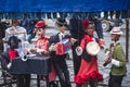 View of street puppet show theatre, with puppeteer puppet master pulling the strings over marionette dolls Royalty Free Stock Photo