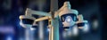 Street security cctv camera filming a night city - 3d rendering Royalty Free Stock Photo