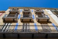 view from the street on the walls of different buildings windows balconies of Europe Royalty Free Stock Photo