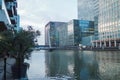 View of streets and buildings of Canary Wharf business district in winter, London. Royalty Free Stock Photo