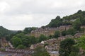 View of the streets and houses of hebden bridge between trees and calder valley landscape in west yorkshire Royalty Free Stock Photo