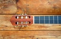 musical instrument - acoustic guitar - on a wooden background Royalty Free Stock Photo