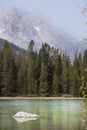 A view of String Lake in Grand Teton National Park with a white rock and mountains in the back. Royalty Free Stock Photo