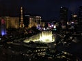 View of the Strip in Las Vegas Dancing Fountain Night Show at Bellagio Hotel. Paris Paris