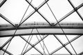 Structure of steel beams and cables in black and white