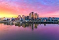 View of a stunning pink sunrise illuminating the modern skyline of Louisville, Kentucky