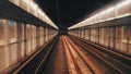 View of subway tunnel as seen from the rear window of moving train. Fast underground train departs from modern subway Royalty Free Stock Photo