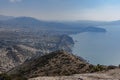 View on Sudak, sea, mount and cape from the top of Falcon Sokol mountain at morning . Crimea Royalty Free Stock Photo