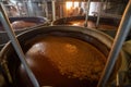 View of the sugar refining process, with molasses being separated from the sugar crystals in large centrifuges