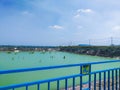 view of the Sukodono water barn in Panceng subdistrict, Gresik district with green water and blue sky