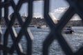 View of suleymaniye mosque among the railings on Galata bridge, passengers and fishing boats, to the view of Istanbul Royalty Free Stock Photo