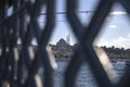 View of suleymaniye mosque among the railings on Galata bridge, passengers and fishing boats, to the view of Istanbul Royalty Free Stock Photo