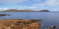 A view of Sumburgh Head at the south of the Shetland, UK, taken from the Ness of Burgi on a calm, sunny day in Spring