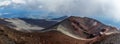 View from the summit of Mount Etna, Sicily below the cloud cover showing volcanic craters, the track to the summit Royalty Free Stock Photo