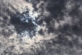 Sun hidden behind dark clouds Royalty Free Stock Photo