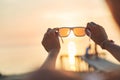 View of the sun, sea and sky through sunglasses Royalty Free Stock Photo