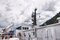 View of sundeck of the Queen of Oak Bay Ferry near the Horseshoe Bay Terminal with dark clouds in the background Royalty Free Stock Photo