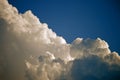 LARGE LOOMIMG CUMULUS CLOUDS IN BLUE SKY Royalty Free Stock Photo
