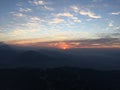 View of Sunrise above Himalayan Mountains from Sarangkot in Nepal. Royalty Free Stock Photo