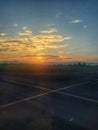 The view of the sunrise on the airstrip is suitable for background or wallpaper