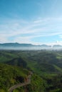 View from sunrise point cukul pangalengan bandung with road, tea plantation, hill blue sky so fresh and adorable with fogg