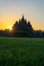 The view of the sunrise in a village with a plaosan buddhist temple background in Yogyakarta, Indonesia