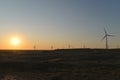 View at sunset of extensive wind farm located in the desert near Wucaitan, Burqin County, Northern Xinjiang, China