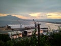 View of the sunset in the Gulf of Naples Mount Vesuvius and the port Royalty Free Stock Photo