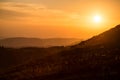 sunset on the mountain foreground without flare