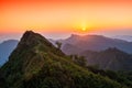 View of sunset over the Phu Chi Fah see from Phu Chi Dao viewpoint in Chiang Rai, Thailand.