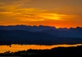 View of sunset over Windermere in Lake District, a region and national park in Cumbria in northwest England Royalty Free Stock Photo