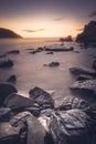 View of a sunset and in the foreground of the rocks