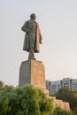 View of the sunset on the statue of Lenin on the waterfront in the Krasnoarmeysk district of V