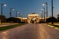 View at sunset to the decoratively decorated alley and decorative arch in front of the Zaabeel Palace in the Dubai city, United