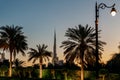 View at sunset to the decoratively decorated alley in front of the Zaabeel Palace in the Dubai city, United Arab Emirates