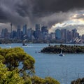 View of Sydney Harbour NSW Australia. Ferry boats partly cloudy colourful skies blue waters Royalty Free Stock Photo