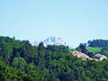 View of the SÃÂ¤ntis Santis or Saentis alpine summit in the Alpstein mountain range  from the city of St. Gallen Royalty Free Stock Photo